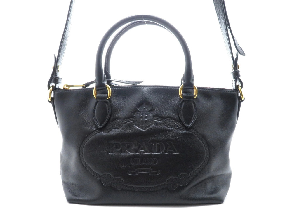 Prada embossed shoulder bag leather black